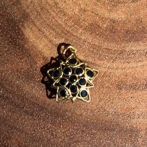 14 karat puffy  heart with sapphires never worn